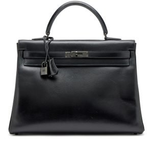 Hermès Limited Edition Black Box Calf So Black Retourne Kelly 35 Black PVD Hardware, 2010 Hermès Limited Edition Black Box Calf So Black Retourne Kelly 35 Black PVD Hardware, 2010